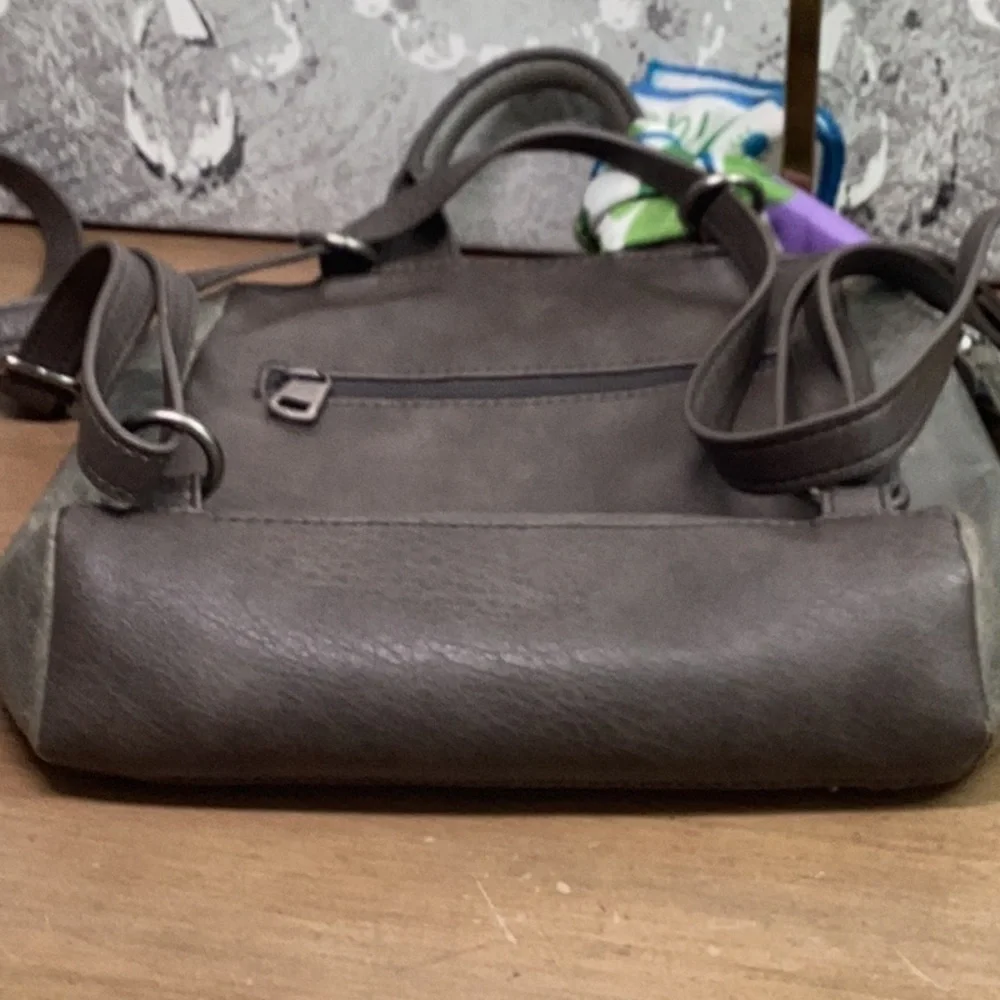 The Sak Leather Gray/ Green Embossed Leather Backpack